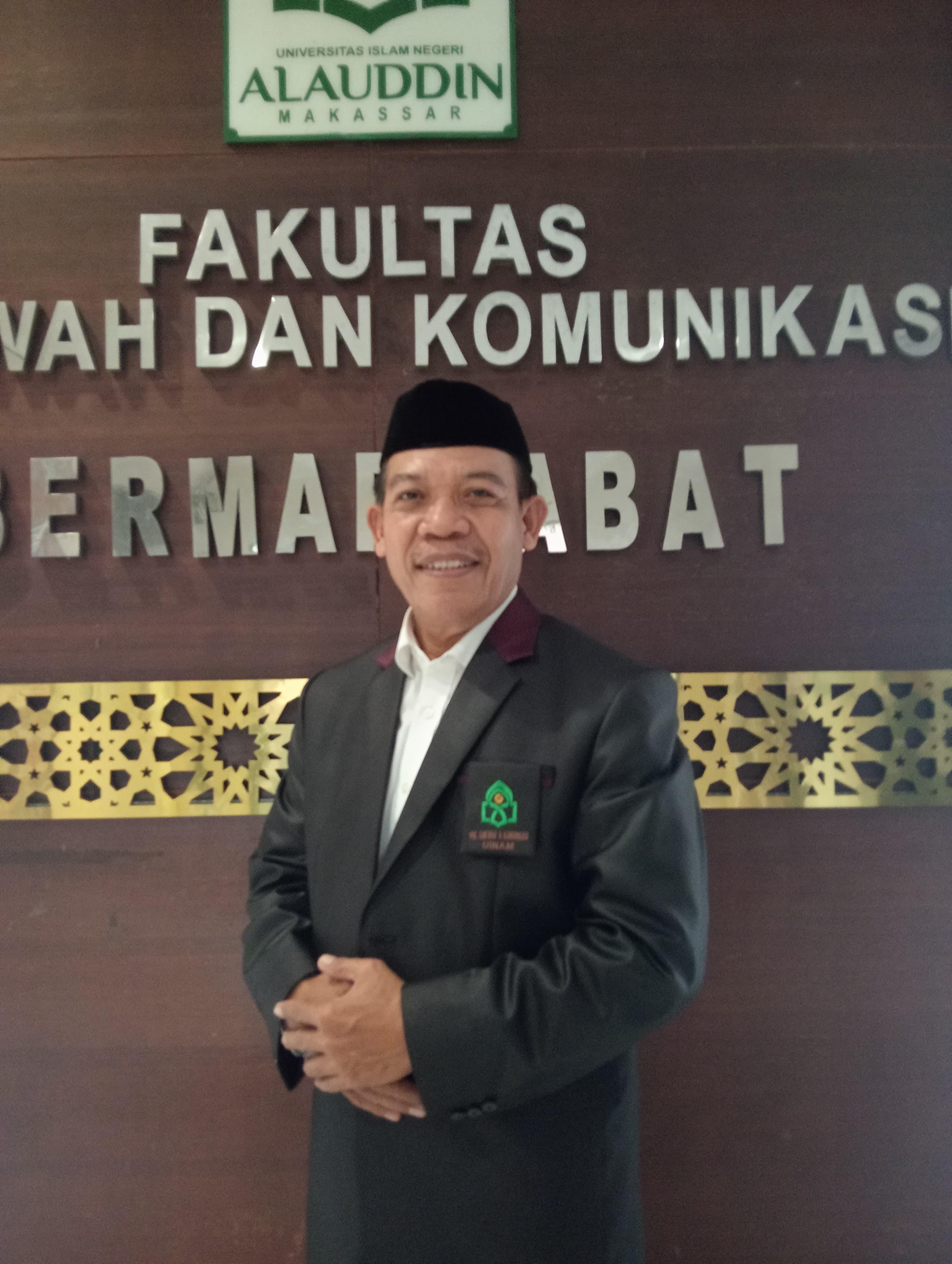 Drs. H. Arham Selo S. Sos., M. S.I., Ph.D.
