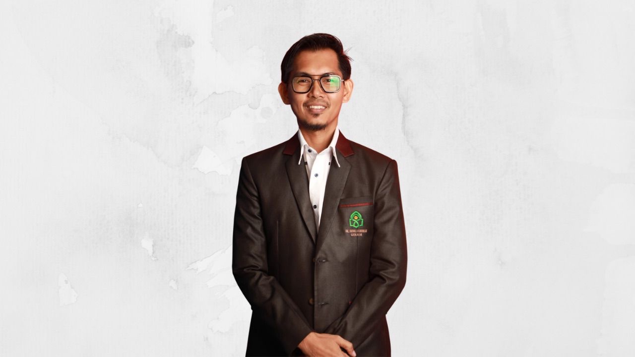 Muh. Sahid, S.I.Kom, M.I.Kom.